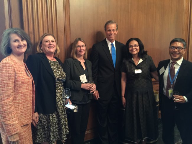 Members of the 2014-2015 class of RWJF Fellows with Senator John Thune.